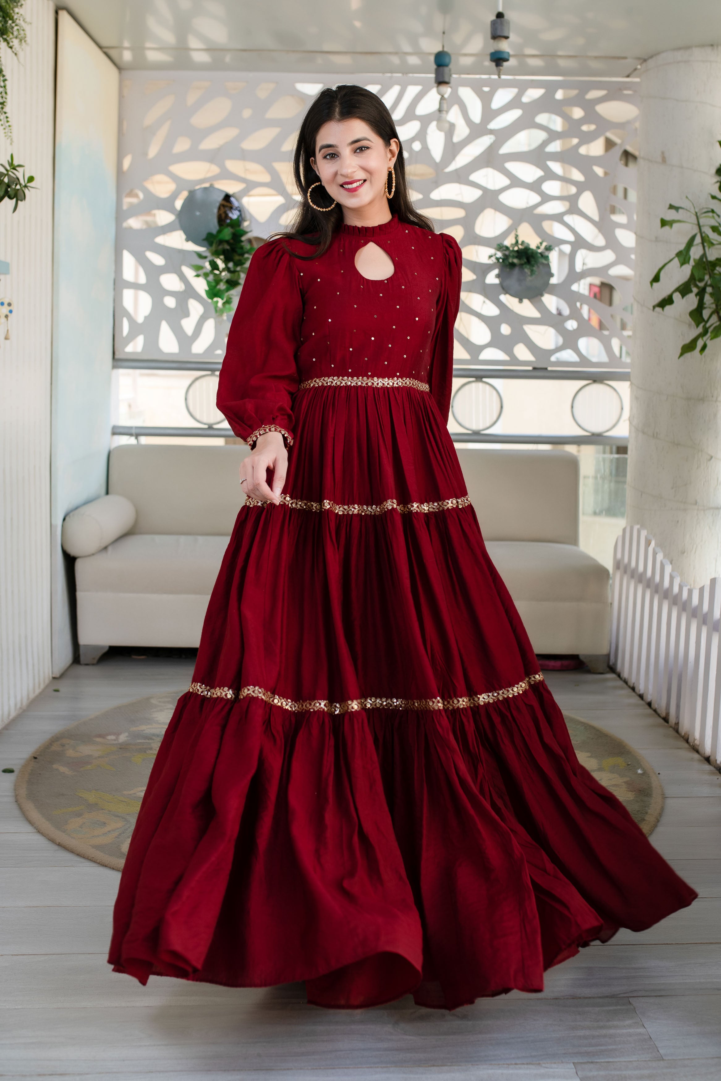 Maroon colour shop gown design